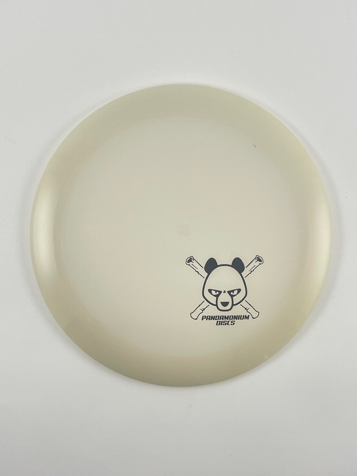 Latitude 64 Ballista Pro disc golf distance driver in white Opto plastic with Pandamonium Panda Corner X stamp