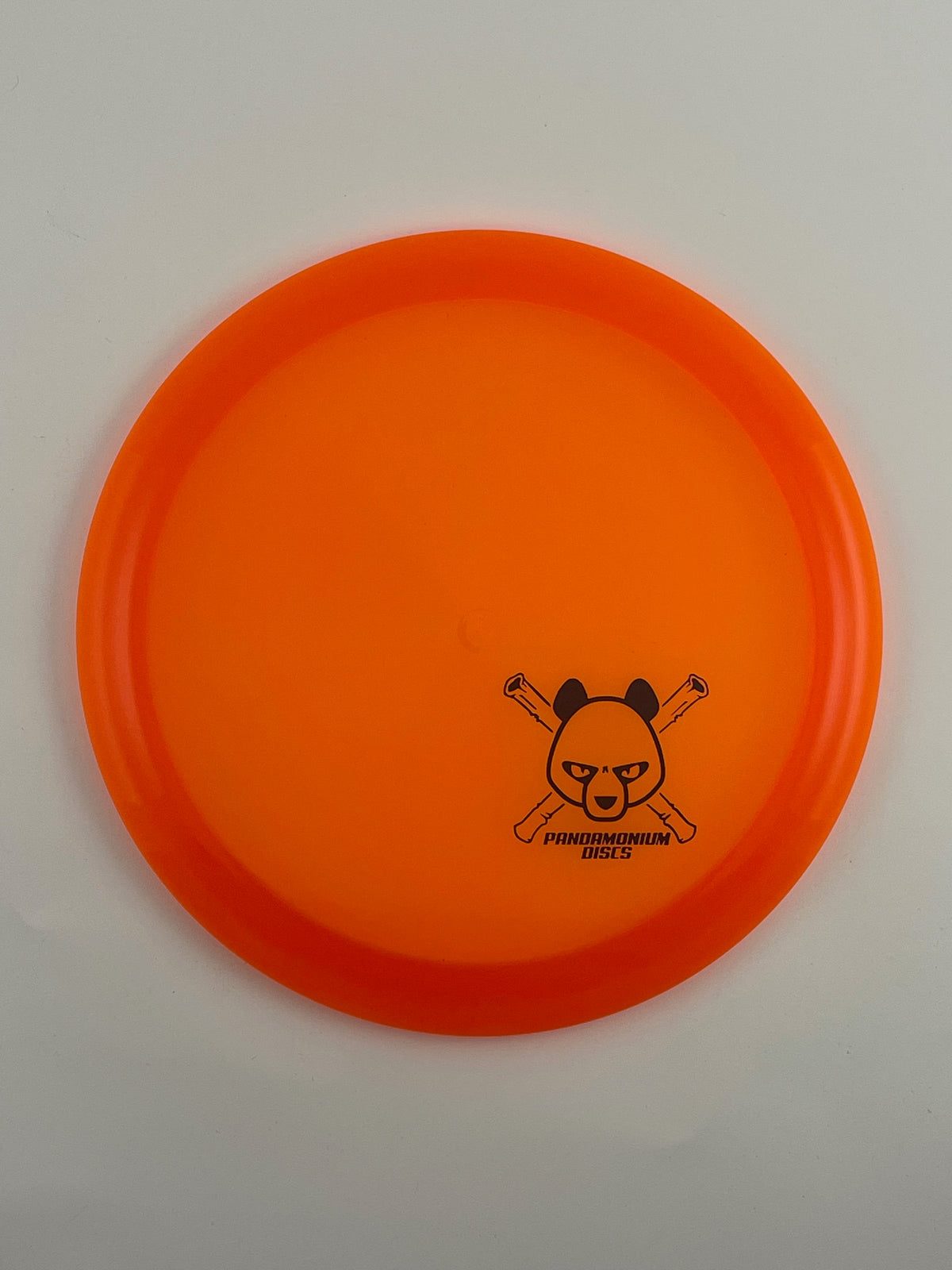 Discmania CD1 disc golf fairway driver in orange C-Line plastic with Pandamonium Panda Corner X stamp