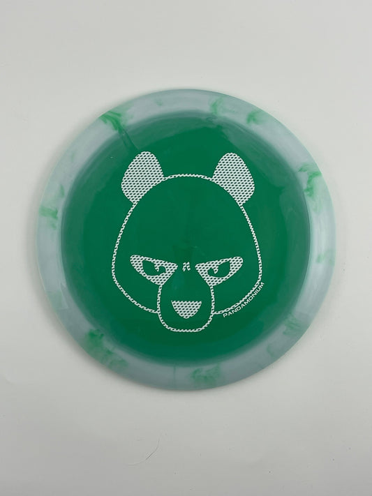 Innova Wraith disc golf distance driver in white and green Halo Star plastic with Pandamonium Big Panda stamp