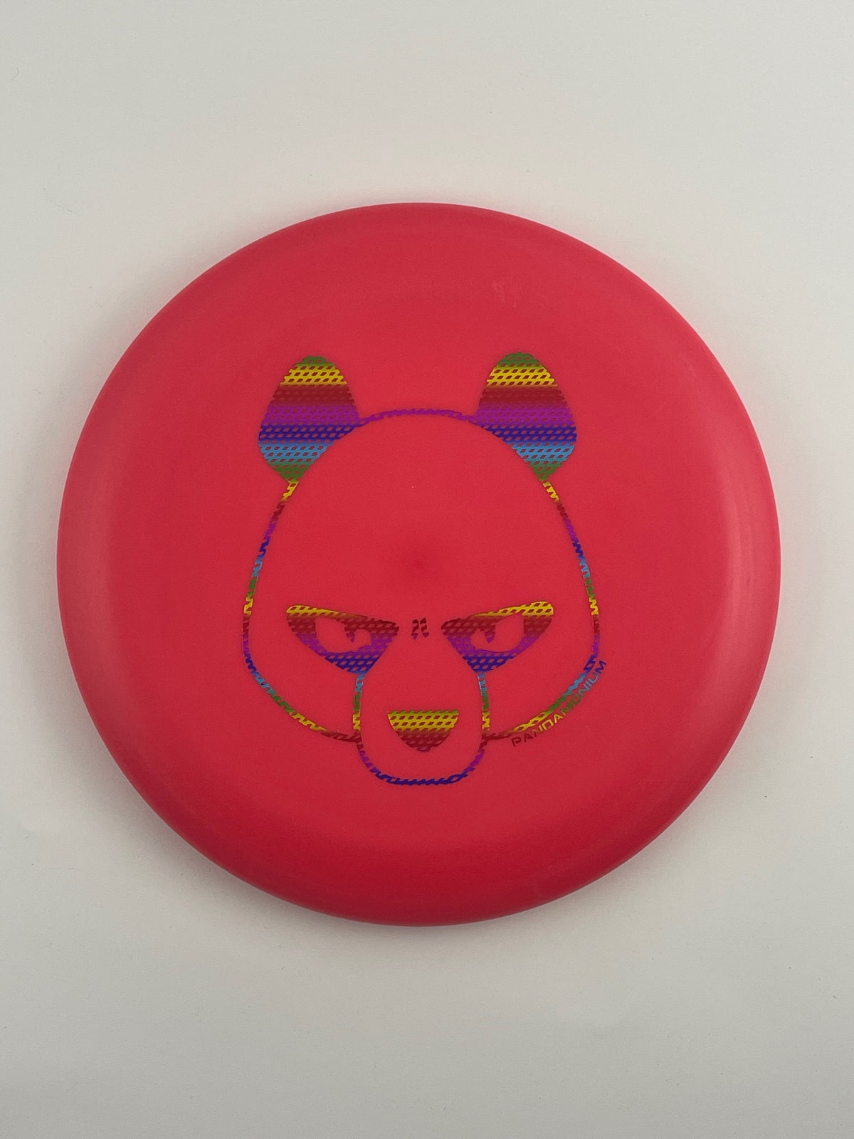 Innova KC Aviar disc golf putt and approach in magenta Pro plastic with Pandamonium Big Panda stamp