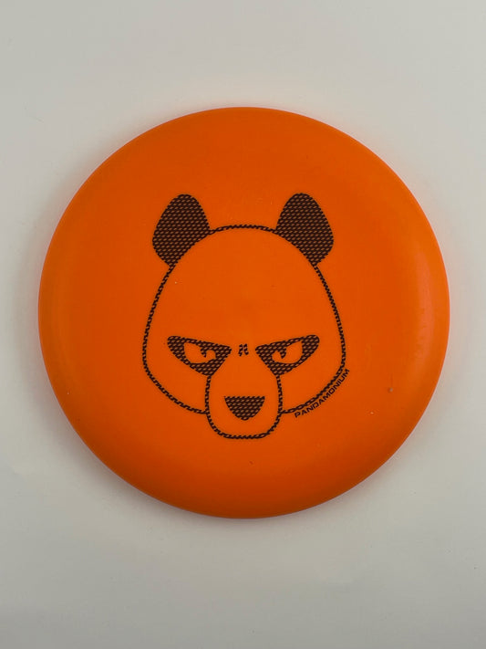Innova Aviar disc golf putt and approach in orange R-Pro plastic with Pandamonium Big Panda stamp