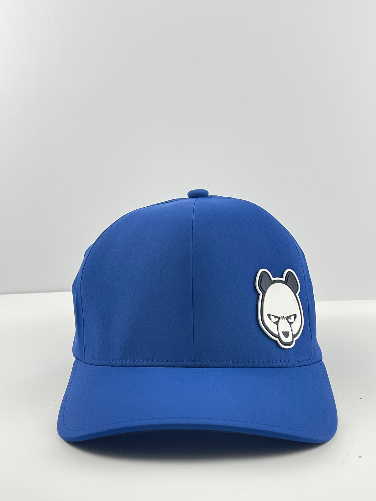 Pandamonium Discs Corner Patch Delta disc golf hat in blue, Flexfit