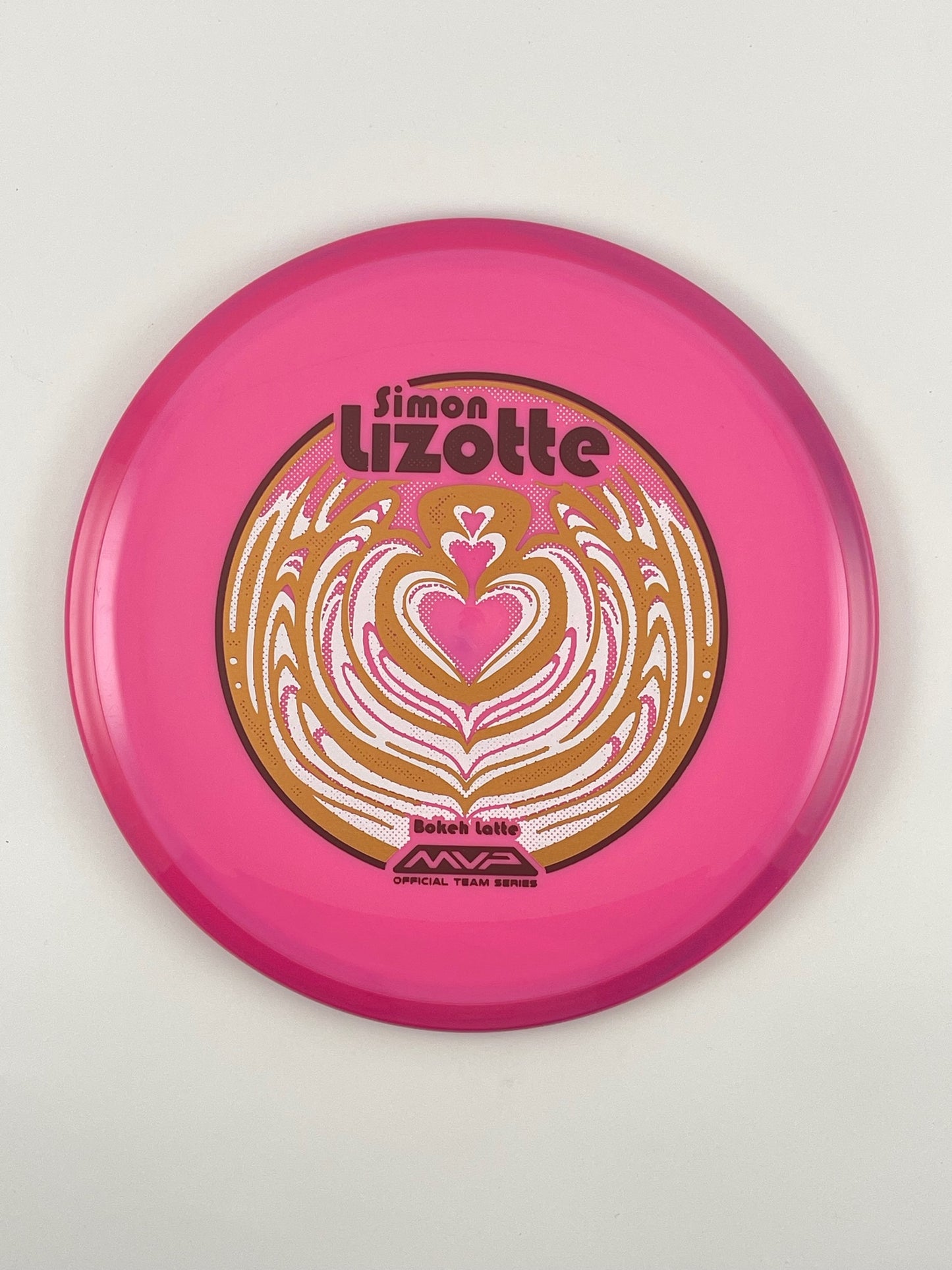 Axiom Bokeh disc golf fairway driver in pink Neutron plastic with Pandamonium Bokeh Latte stamp