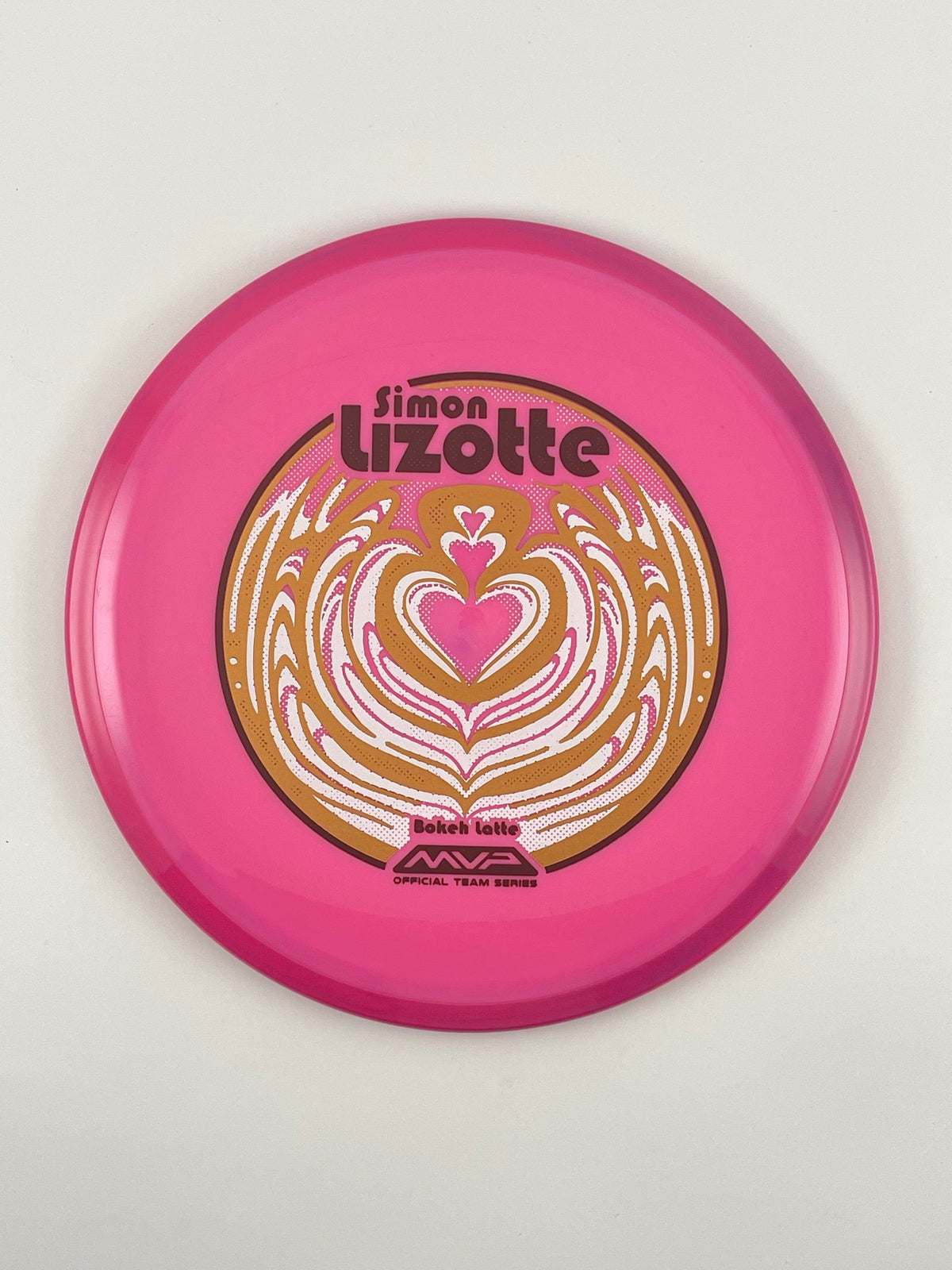 Axiom Bokeh disc golf fairway driver in pink Neutron plastic with Pandamonium Bokeh Latte stamp