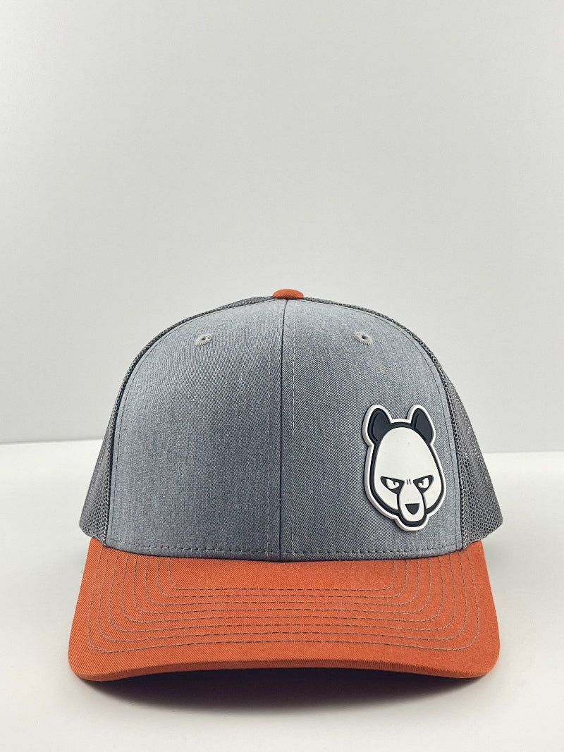 Pandamonium Discs Corner Patch Trucker disc golf hat in orange, Richardson