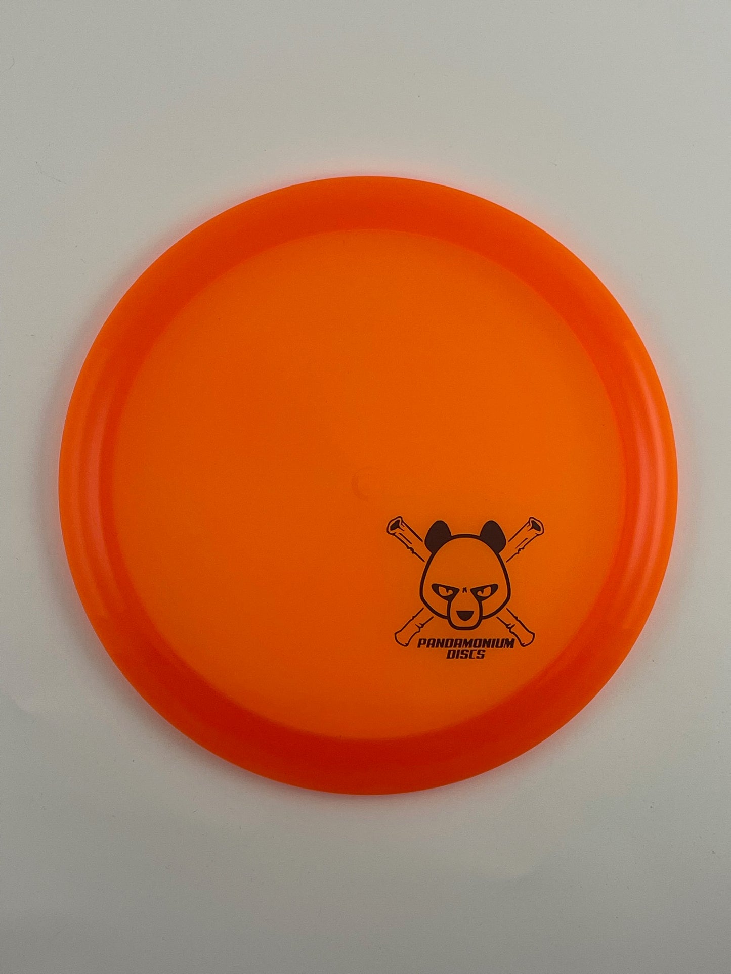 Discmania CD1 disc golf fairway driver in orange C-Line plastic with Pandamonium Panda Corner X stamp