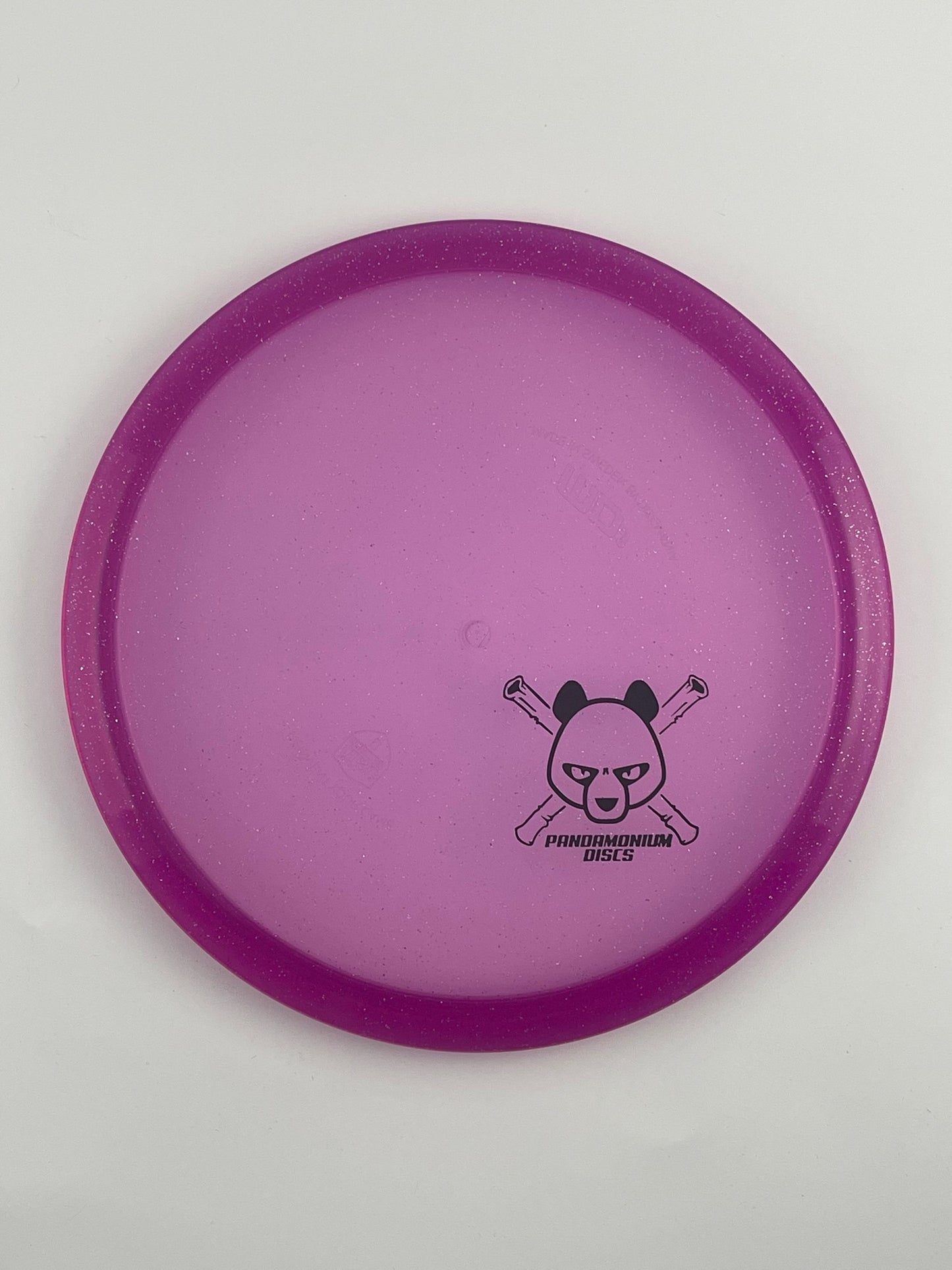 Discmania MD3 disc golf midrange in purple C-Line Metal Flake plastic with Pandamonium Panda Corner X stamp