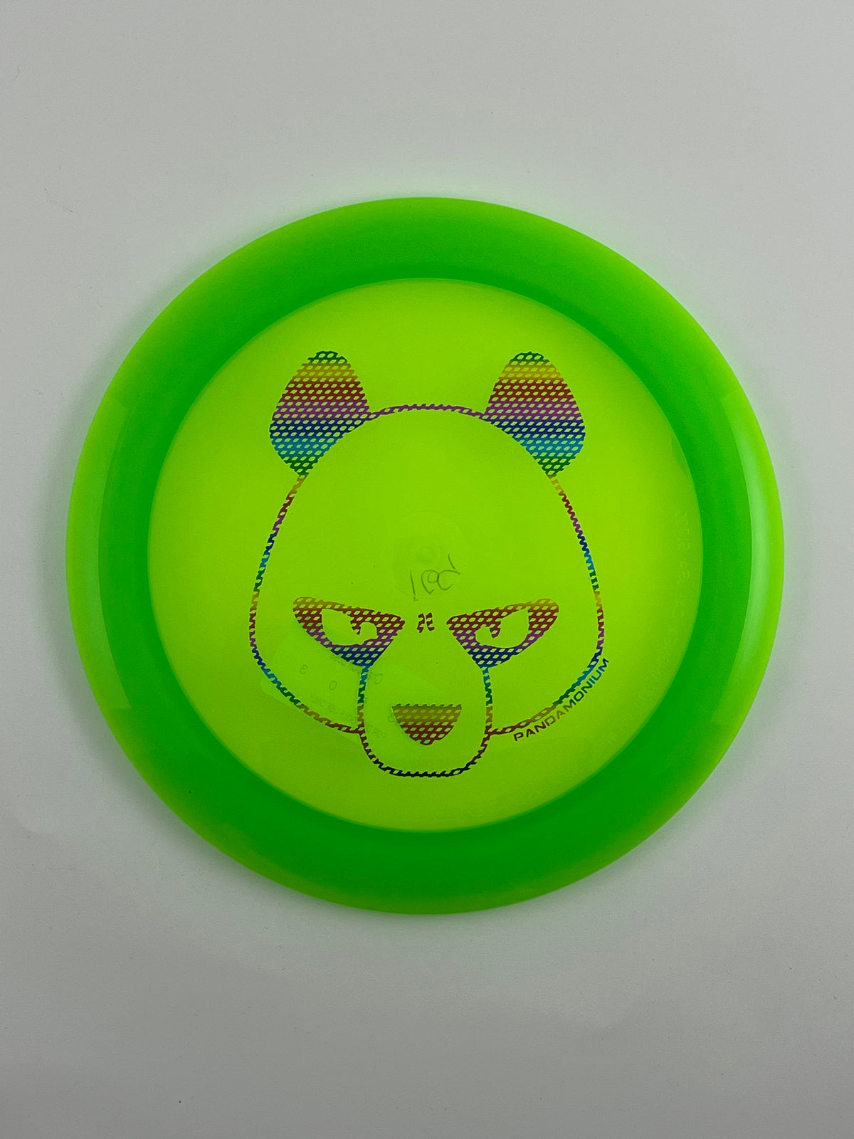 Innova Boss disc golf distance driver in green Champion plastic with Pandamonium Big Panda stamp
