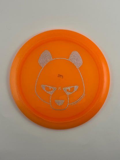 Innova Boss disc golf distance driver in orange Champion plastic with Pandamonium Big Panda stamp
