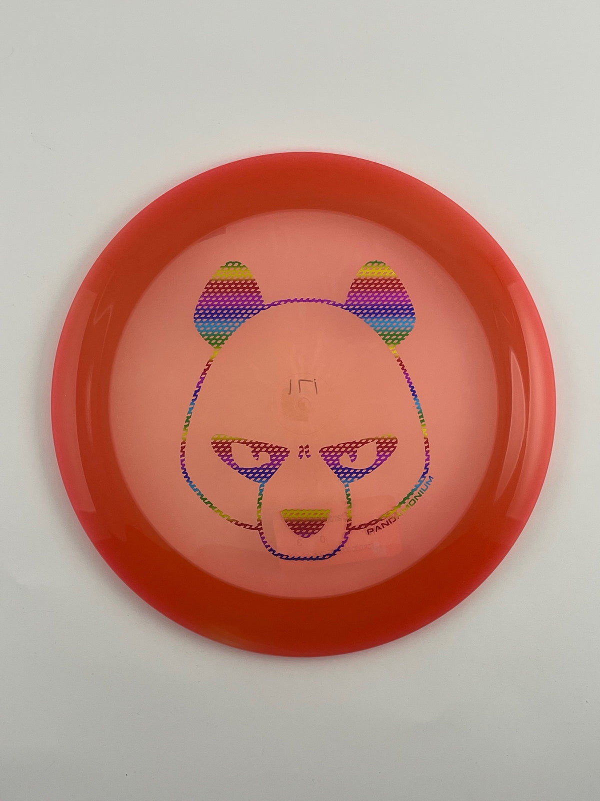Innova Boss disc golf distance driver in red and orange Champion plastic with Pandamonium Big Panda stamp
