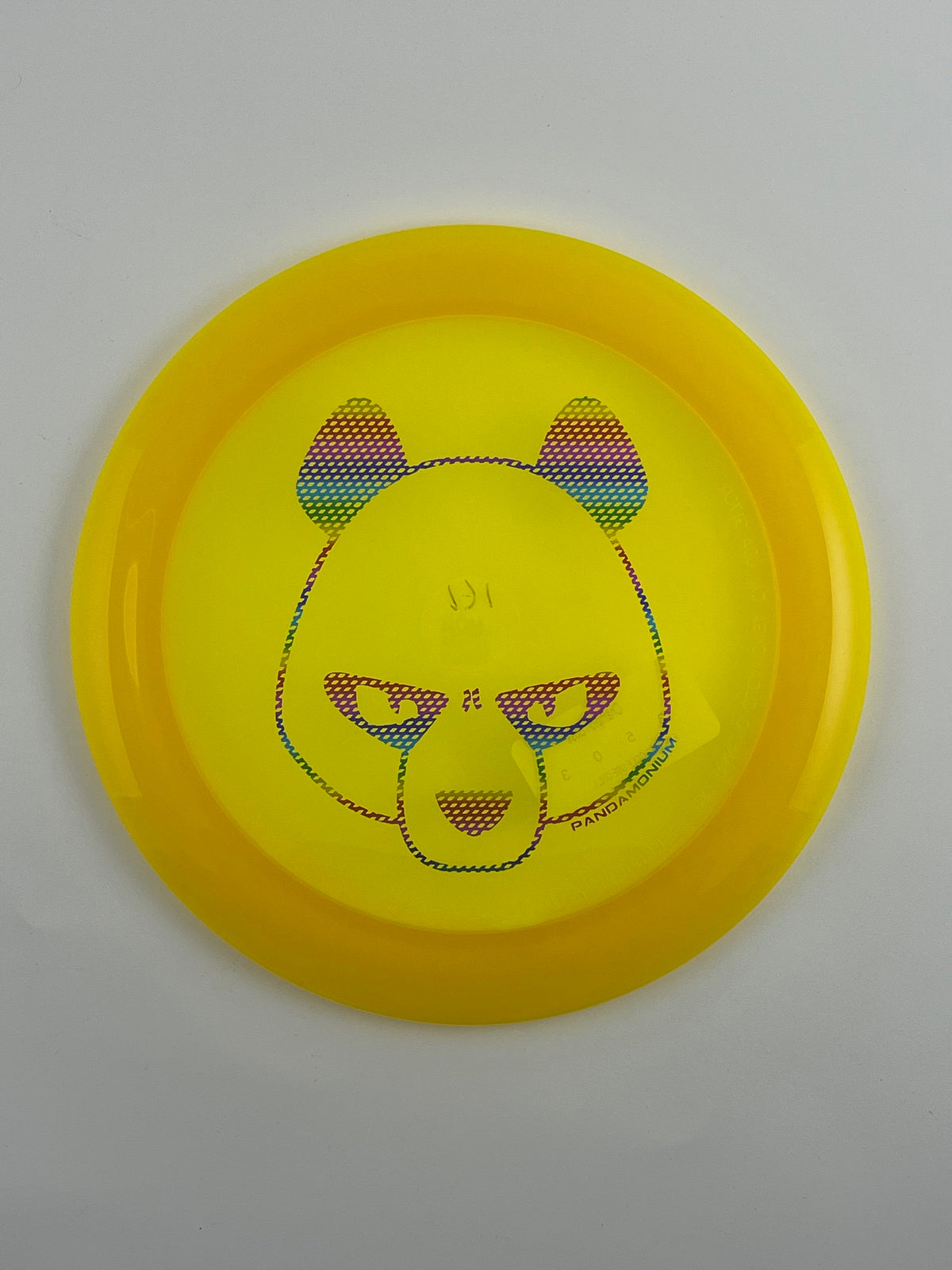 Innova Boss disc golf distance driver in yellow Champion plastic with Pandamonium Big Panda stamp