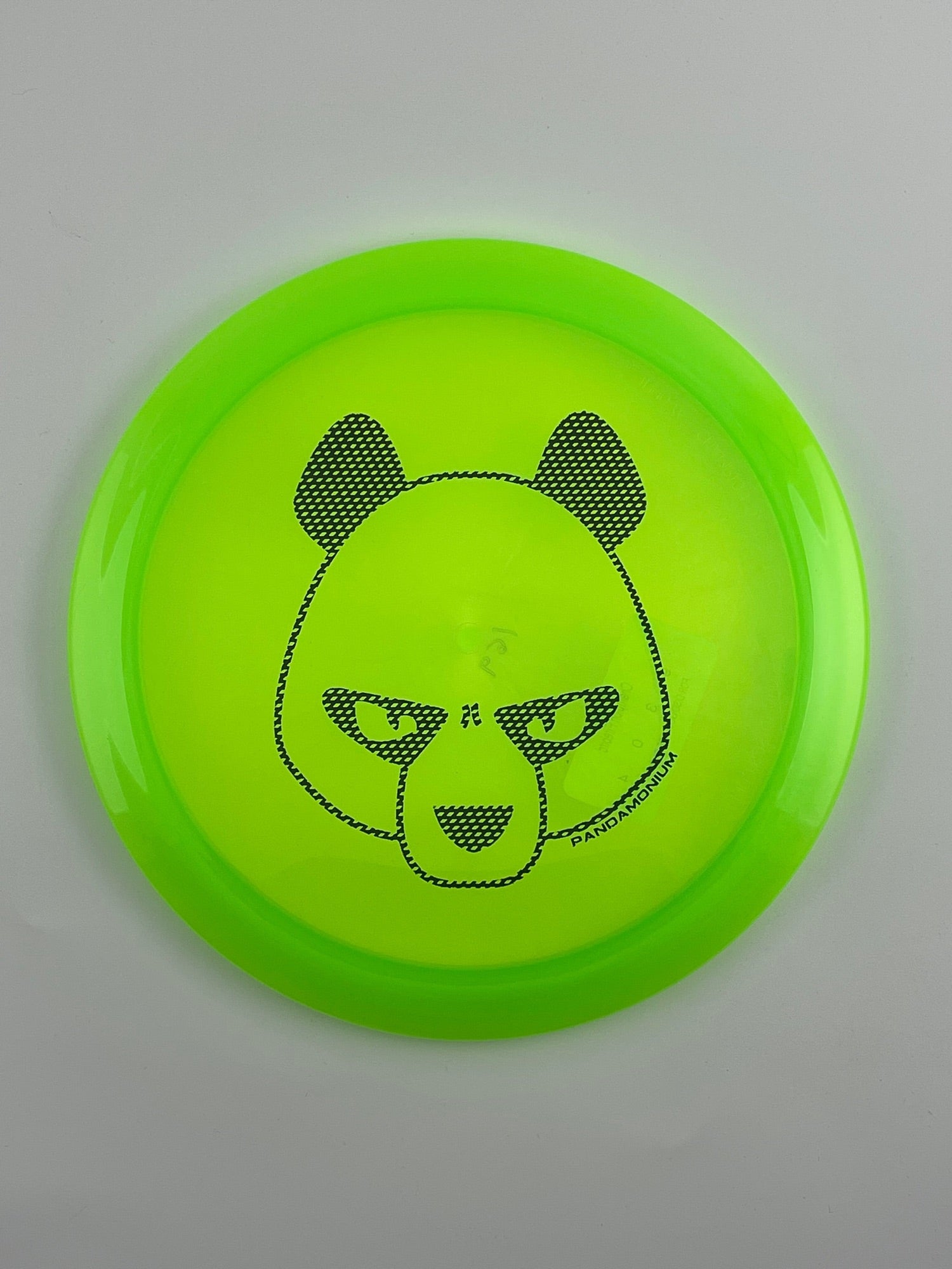 Innova Firebird disc golf fairway driver in green Champion plastic with Pandamonium Big Panda stamp
