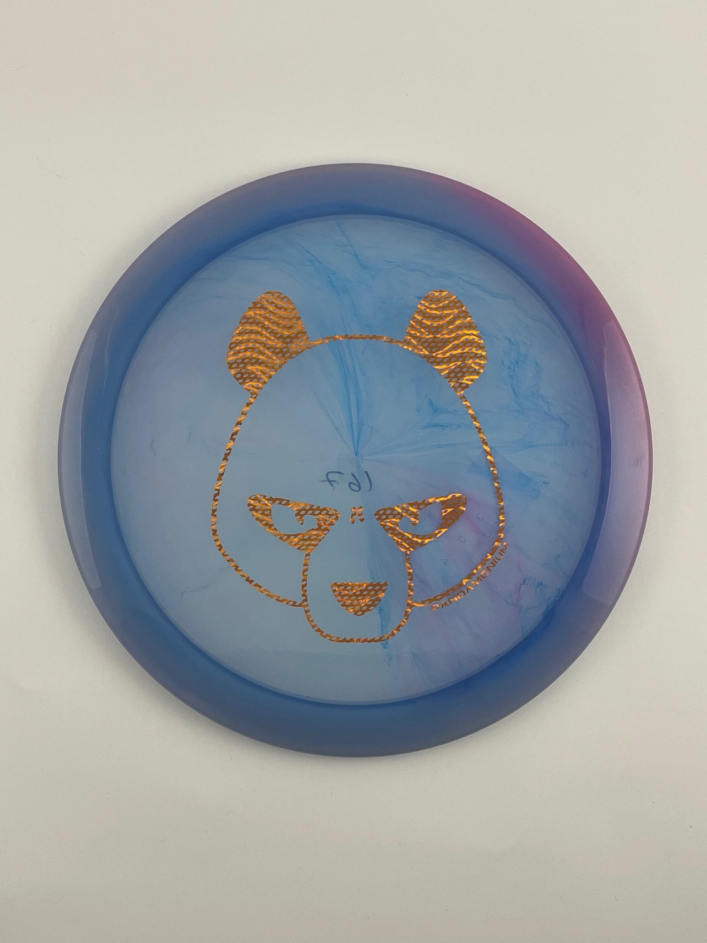 Innova Firebird disc golf fairway driver in purple and blue Champion plastic with Pandamonium Big Panda stamp
