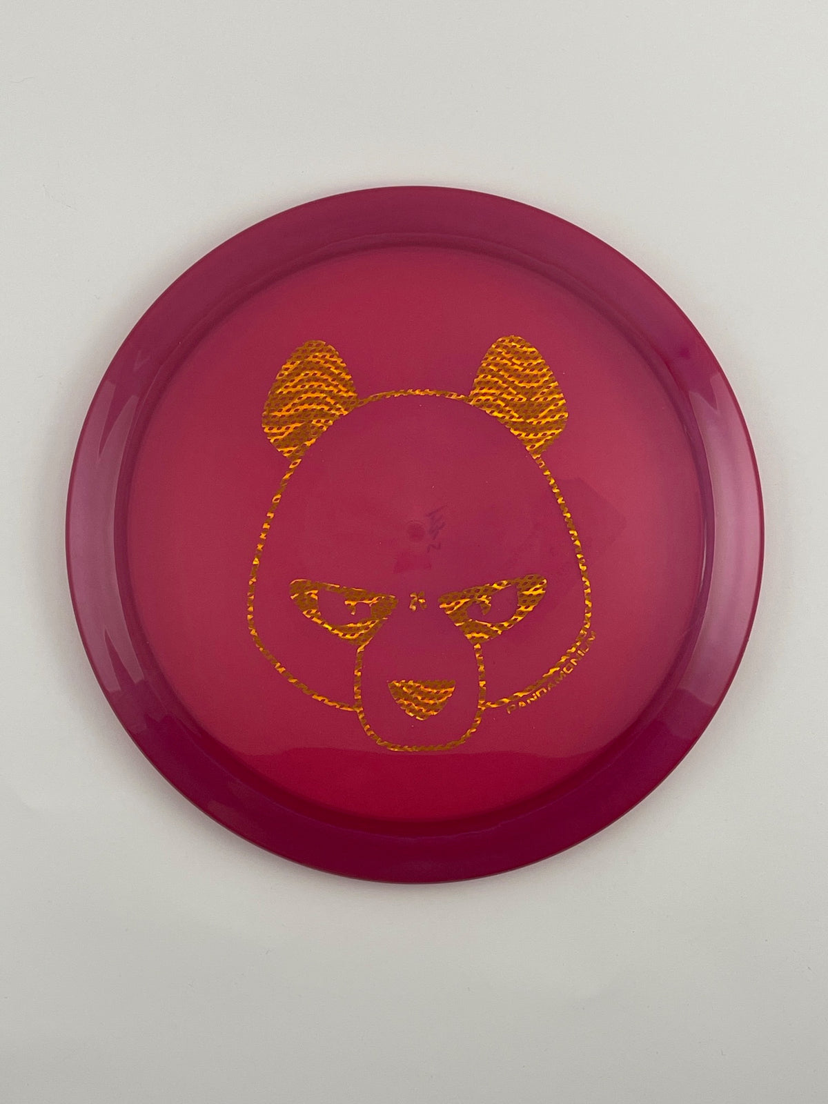 Innova Firebird disc golf fairway driver in purple Champion plastic with Pandamonium Big Panda stamp