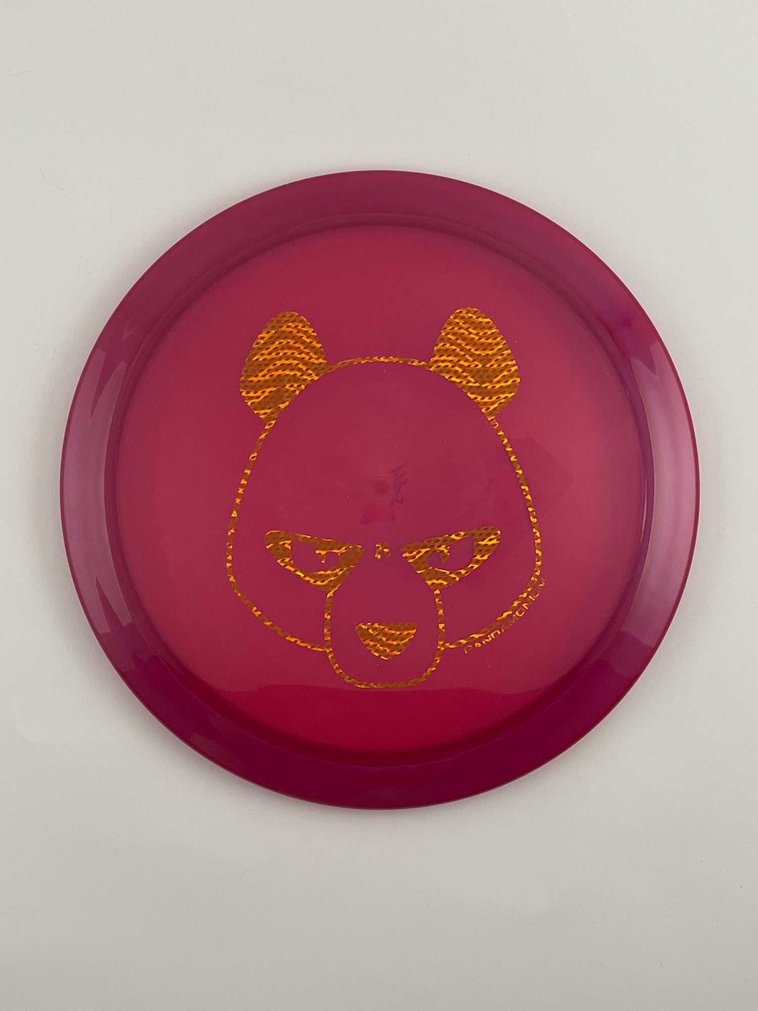 Innova Firebird disc golf fairway driver in purple Champion plastic with Pandamonium Big Panda stamp