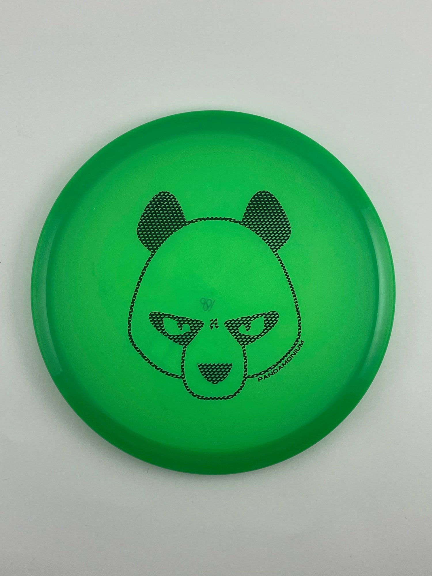 Innova Mako3 disc golf midrange in green Champion plastic with Pandamonium Big Panda stamp