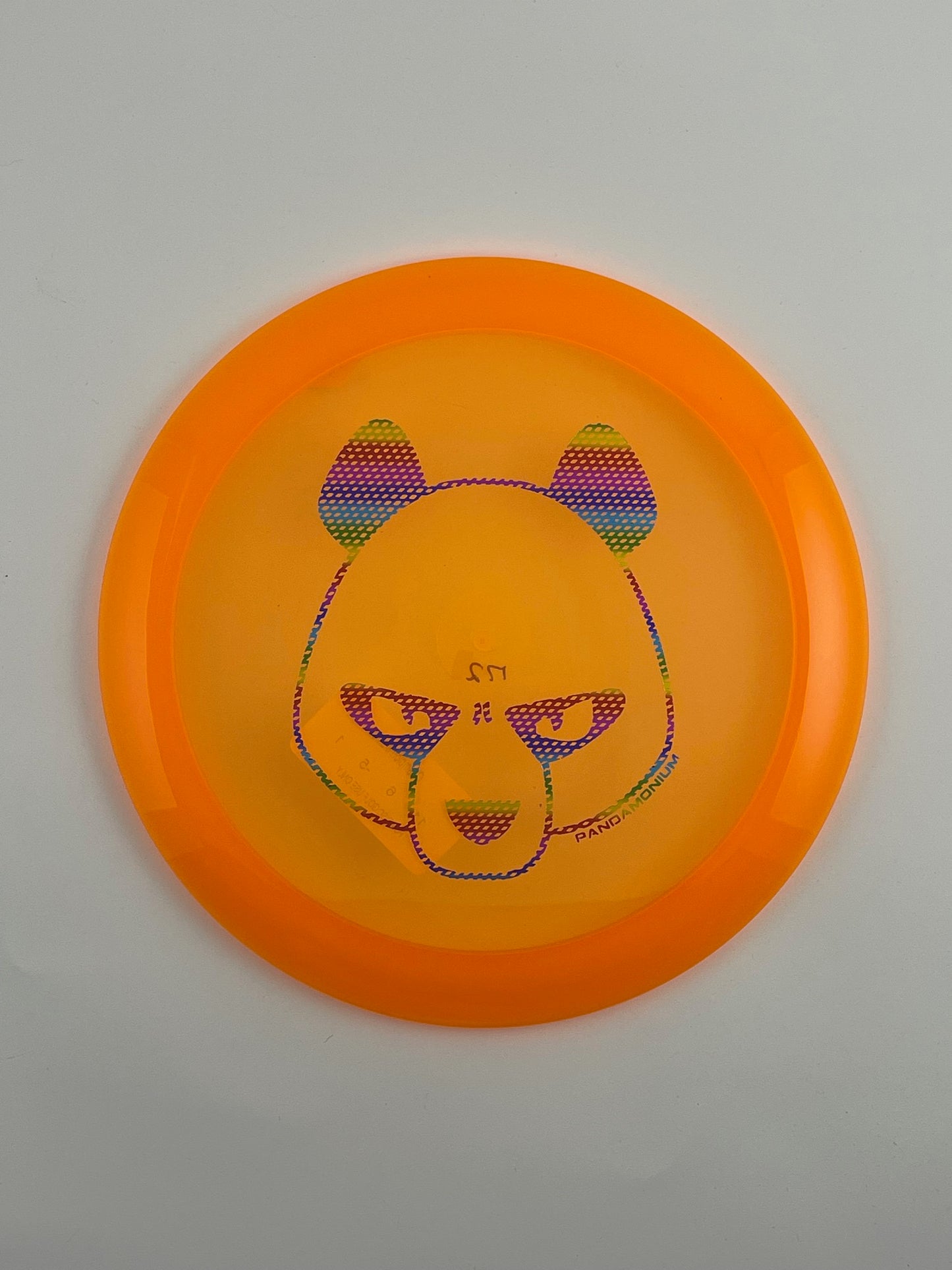 Innova Mamba disc golf distance driver in orange Champion plastic with Pandamonium Big Panda stamp