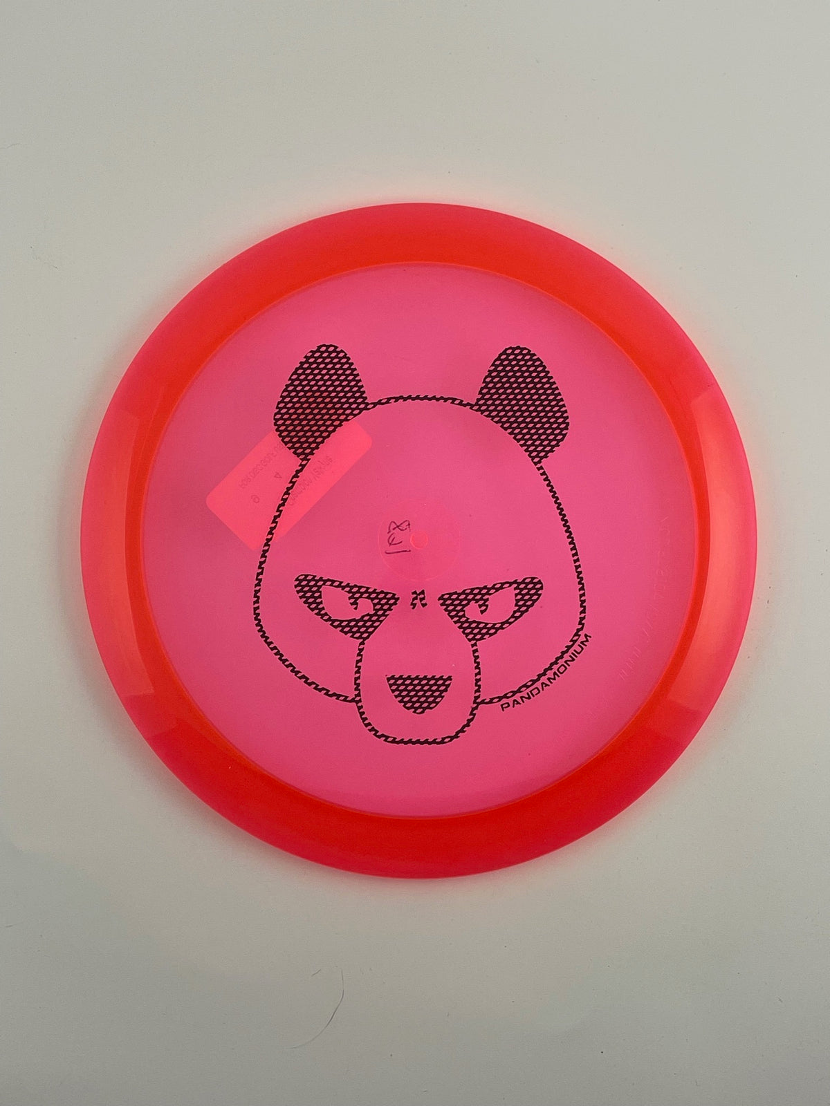 Innova Valkyrie disc golf fairway driver in pink Champion plastic with Pandamonium Big Panda stamp