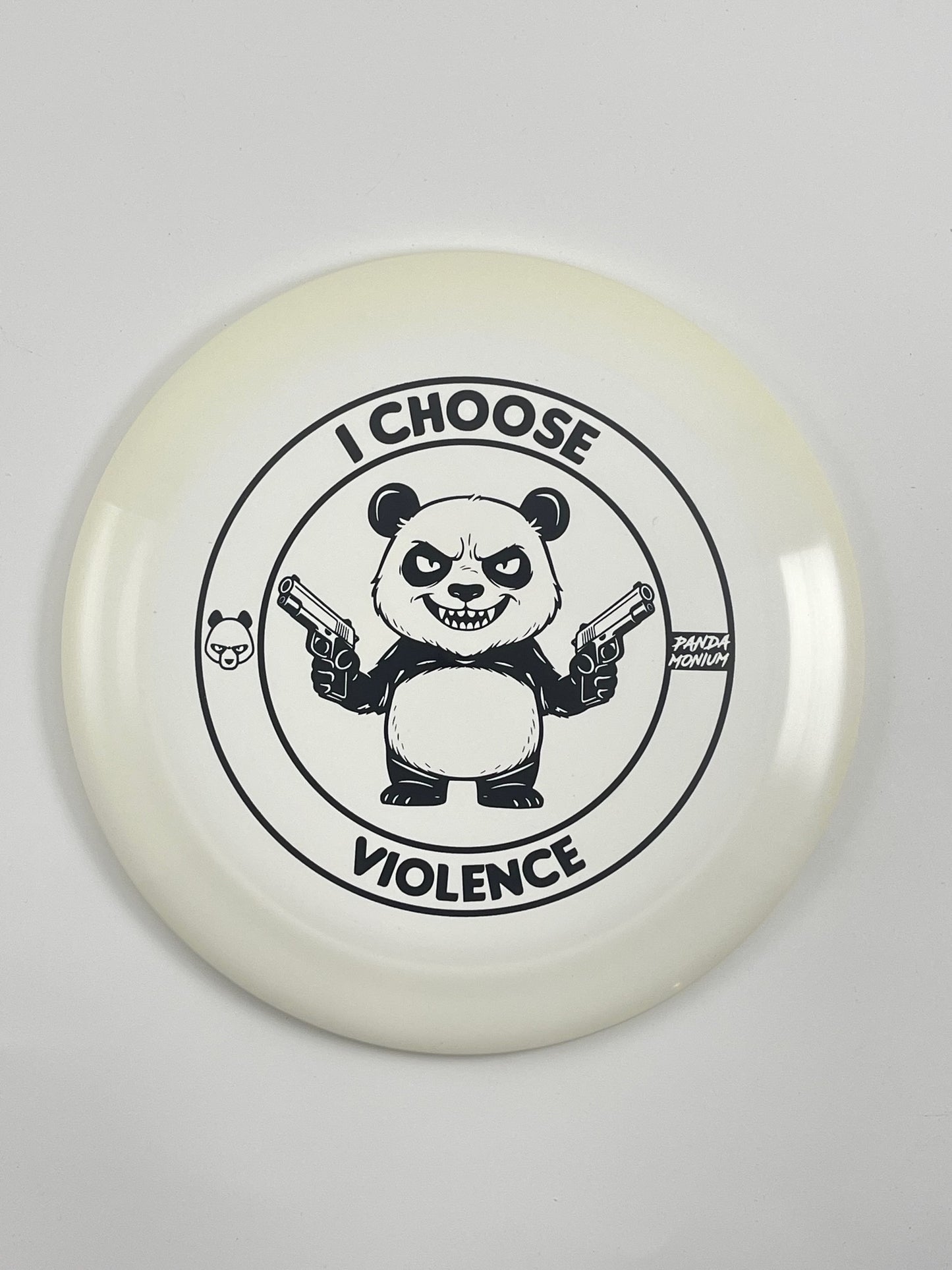 Discraft Nuke disc golf distance driver in white ESP plastic with Pandamonium I Choose Violence stamp