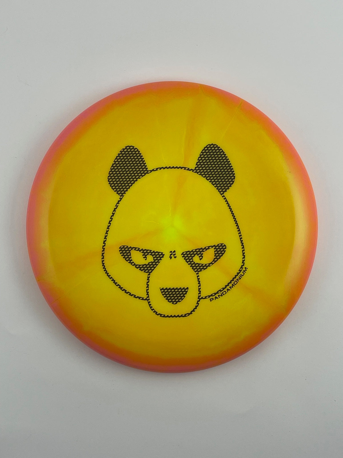 Innova Aviar disc golf putt and approach in pink and orange Halo Star plastic with Pandamonium Big Panda stamp