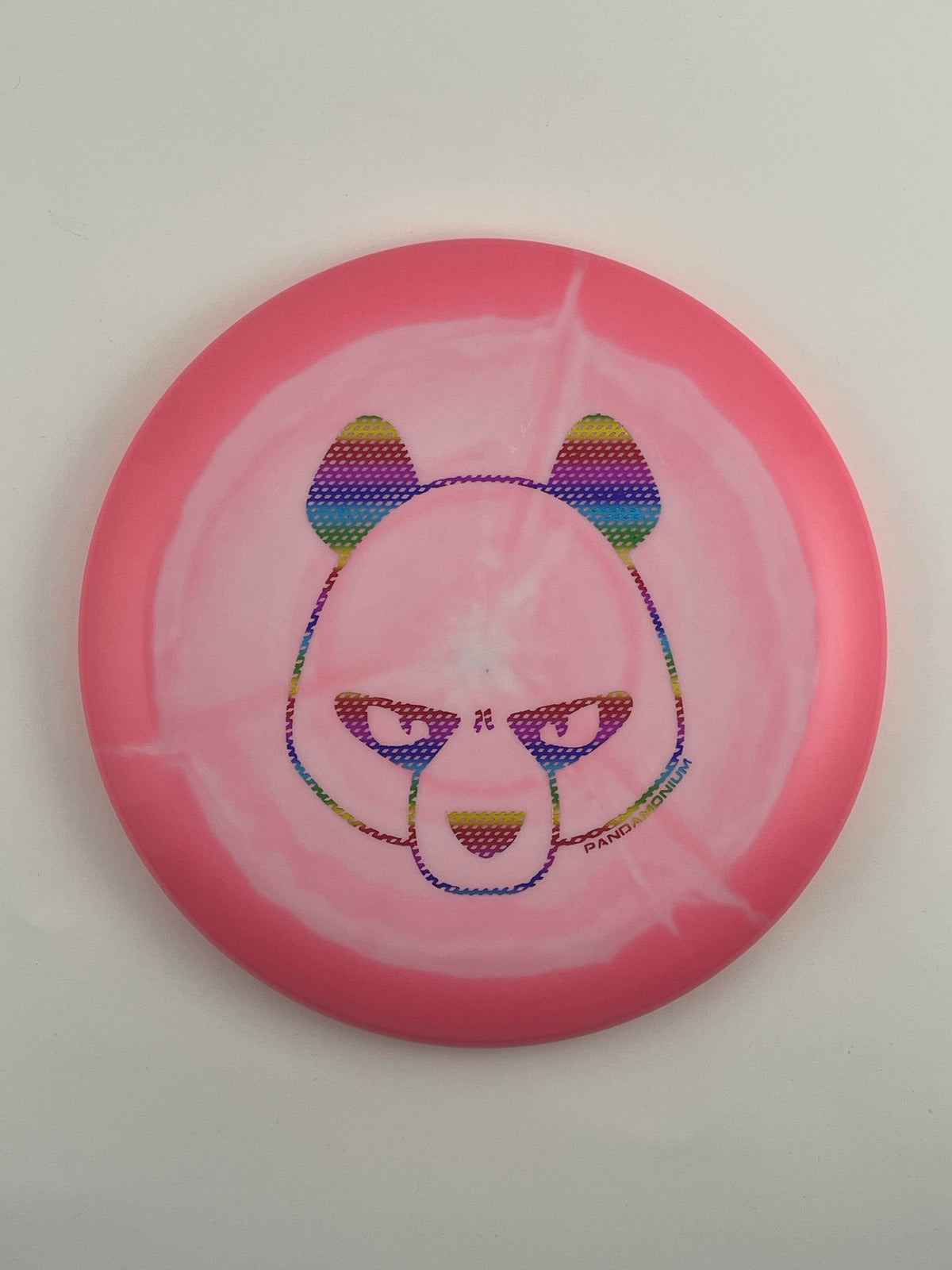 Innova Aviar disc golf putt and approach in pink and white Halo Star plastic with Pandamonium Big Panda stamp