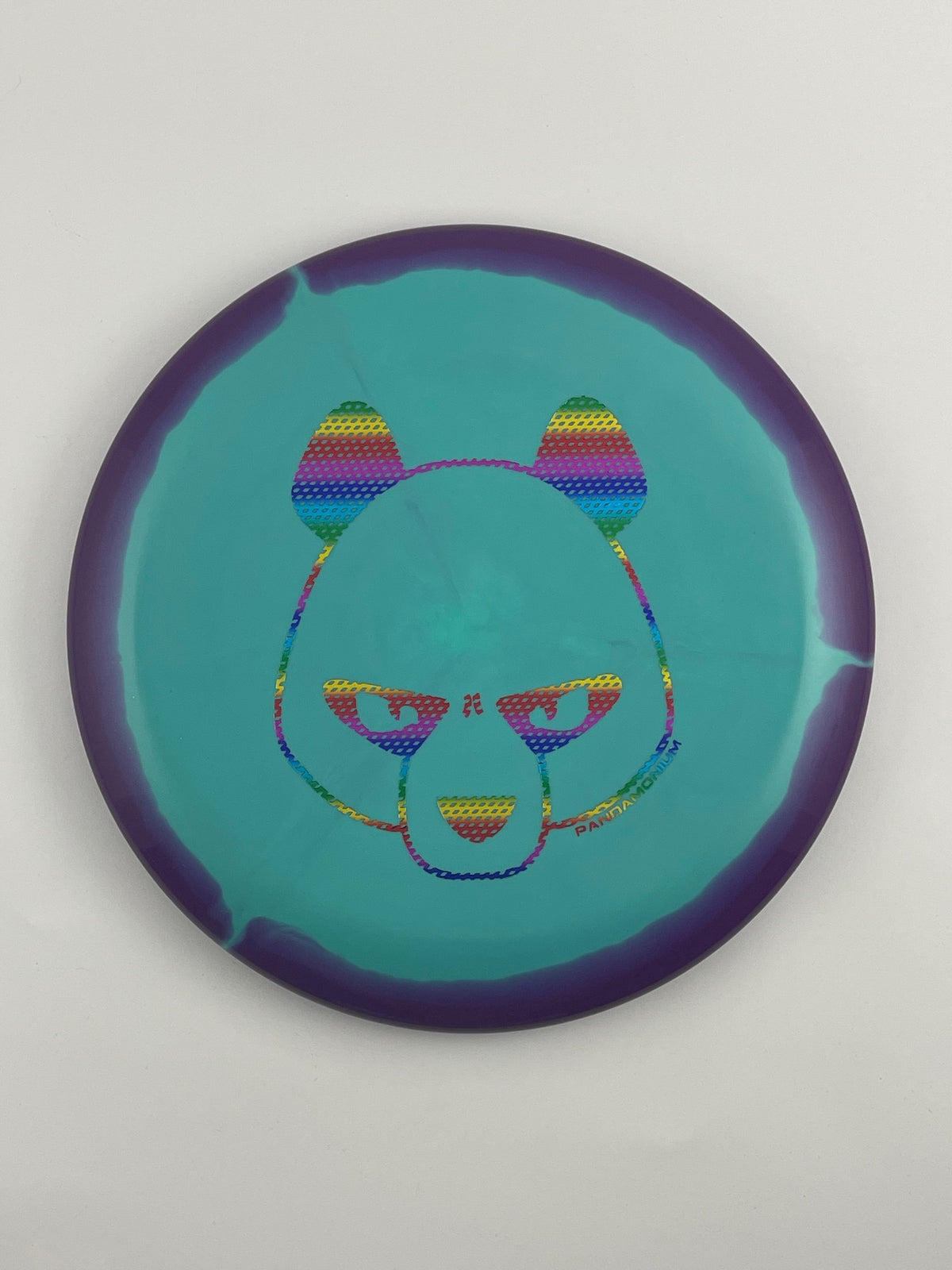 Innova Aviar disc golf putt and approach in purple and teal Halo Star plastic with Pandamonium Big Panda stamp