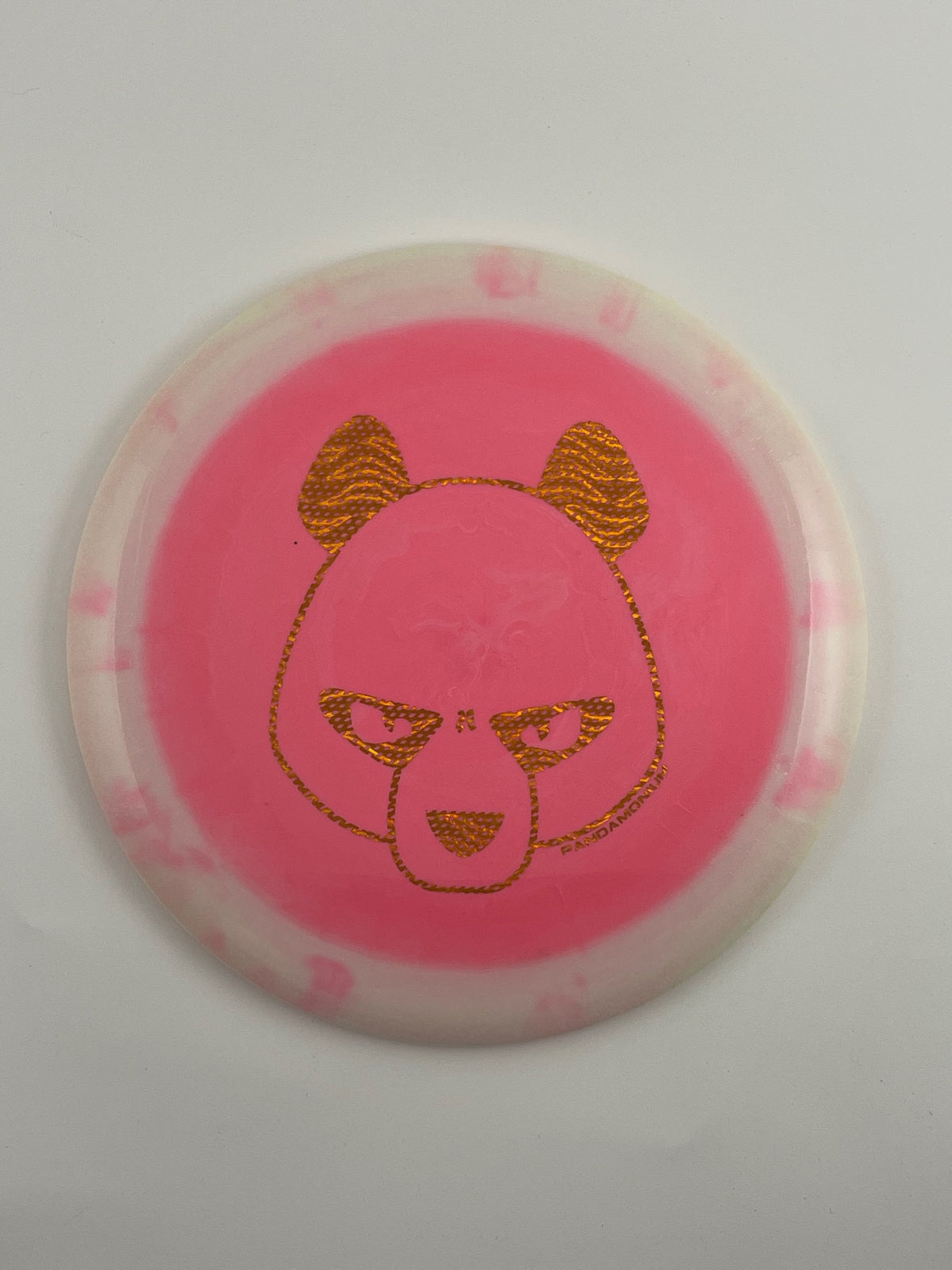 Innova Destroyer disc golf distance driver in white and pink Halo Star plastic with Pandamonium Big Panda stamp