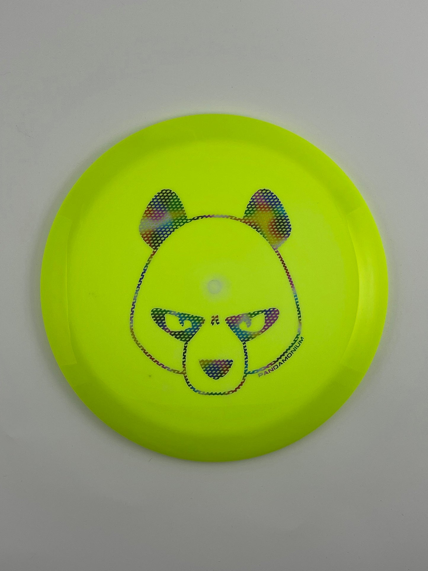 Innova Mamba disc golf distance driver in lime and green Halo Star plastic with Pandamonium Big Panda stamp