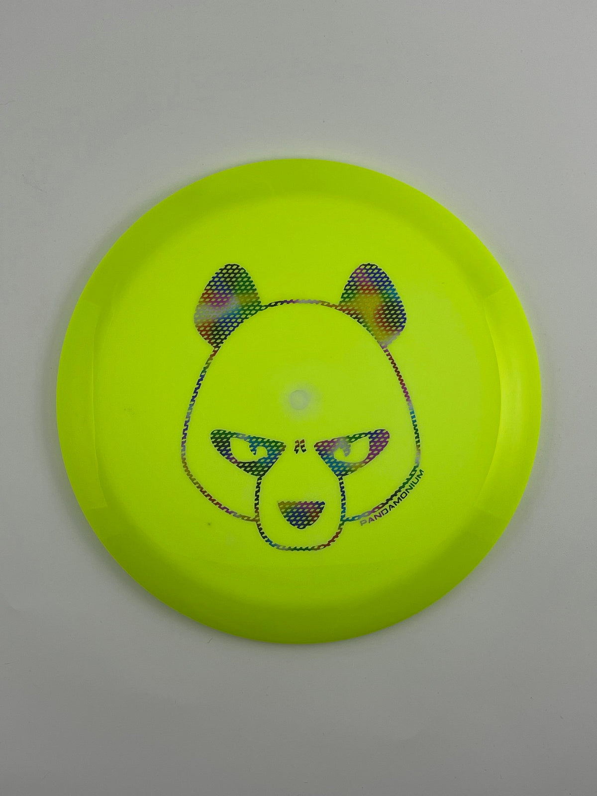 Innova Mamba disc golf distance driver in lime and green Halo Star plastic with Pandamonium Big Panda stamp