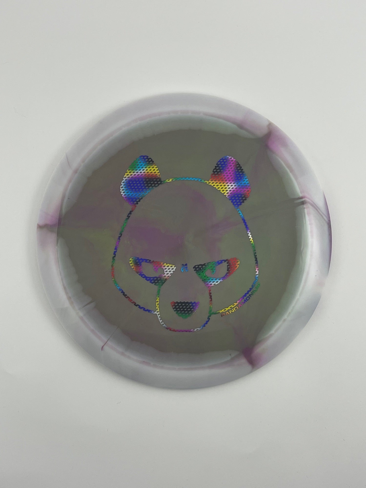 Innova Mamba disc golf distance driver in purple and white Halo Star plastic with Pandamonium Big Panda stamp