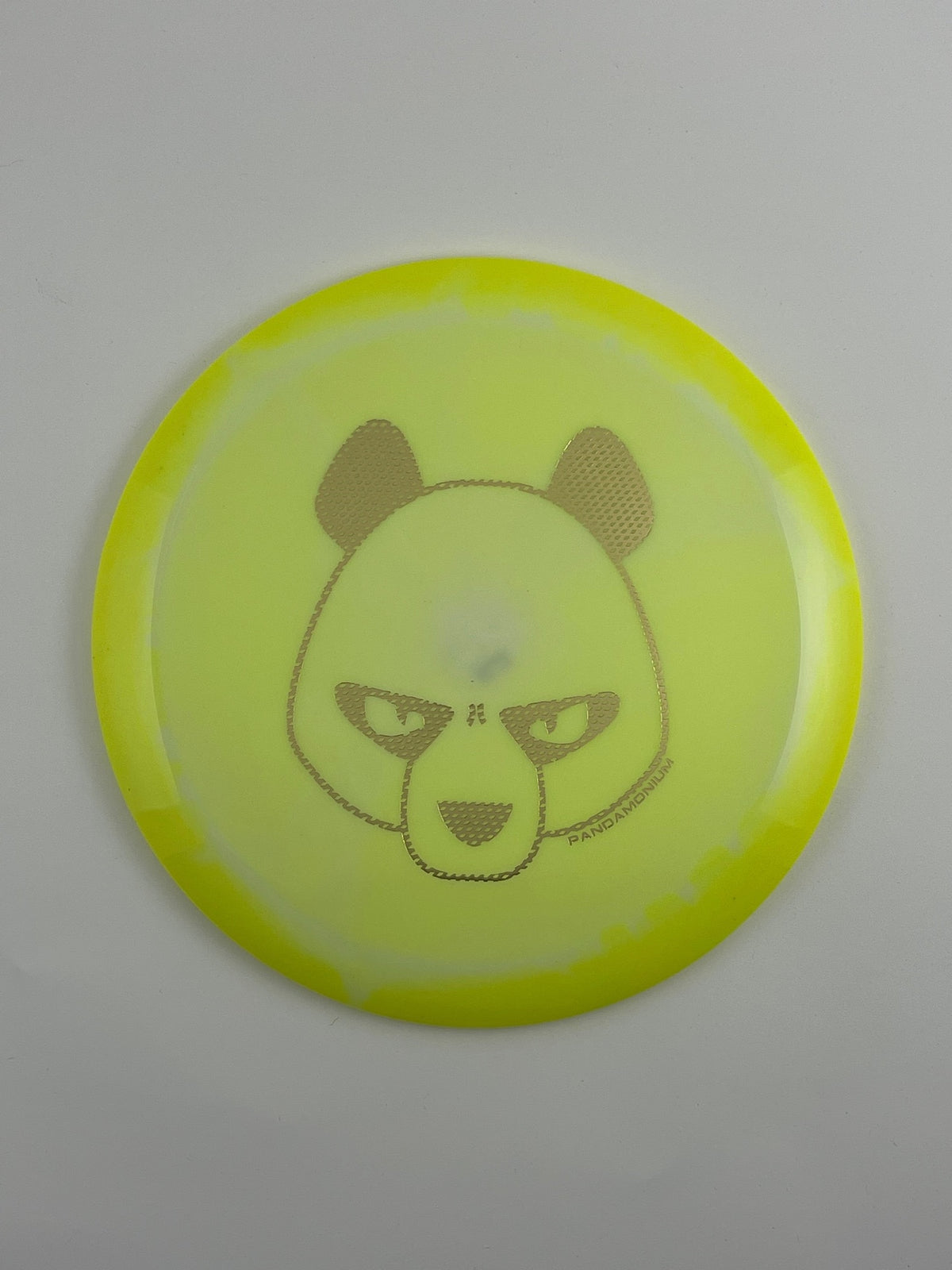 Innova Mamba disc golf distance driver in yellow and light yellow Halo Star plastic with Pandamonium Big Panda stamp