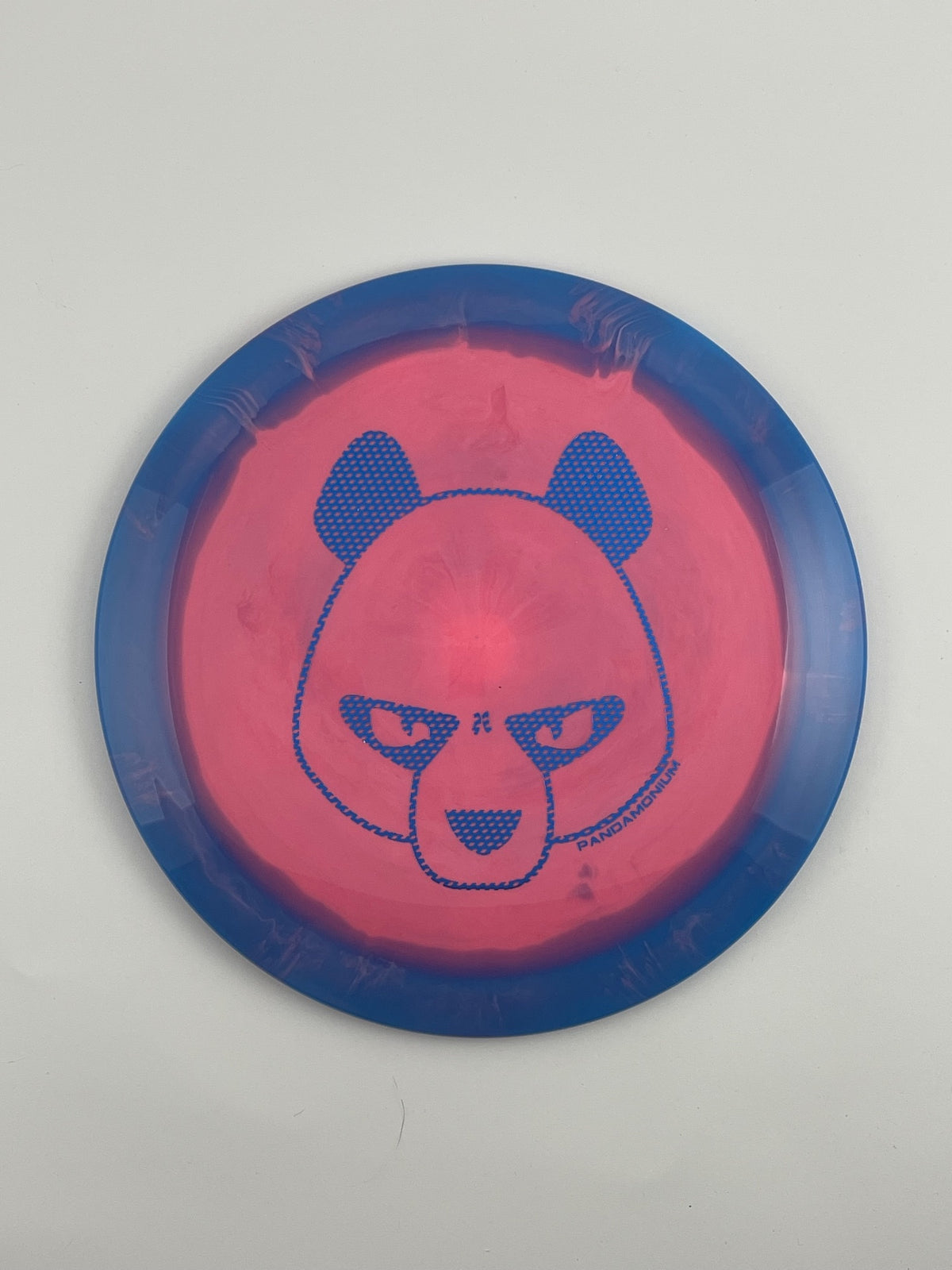 Innova Shryke disc golf distance driver in blue and pink Halo Star plastic with Pandamonium Big Panda stamp