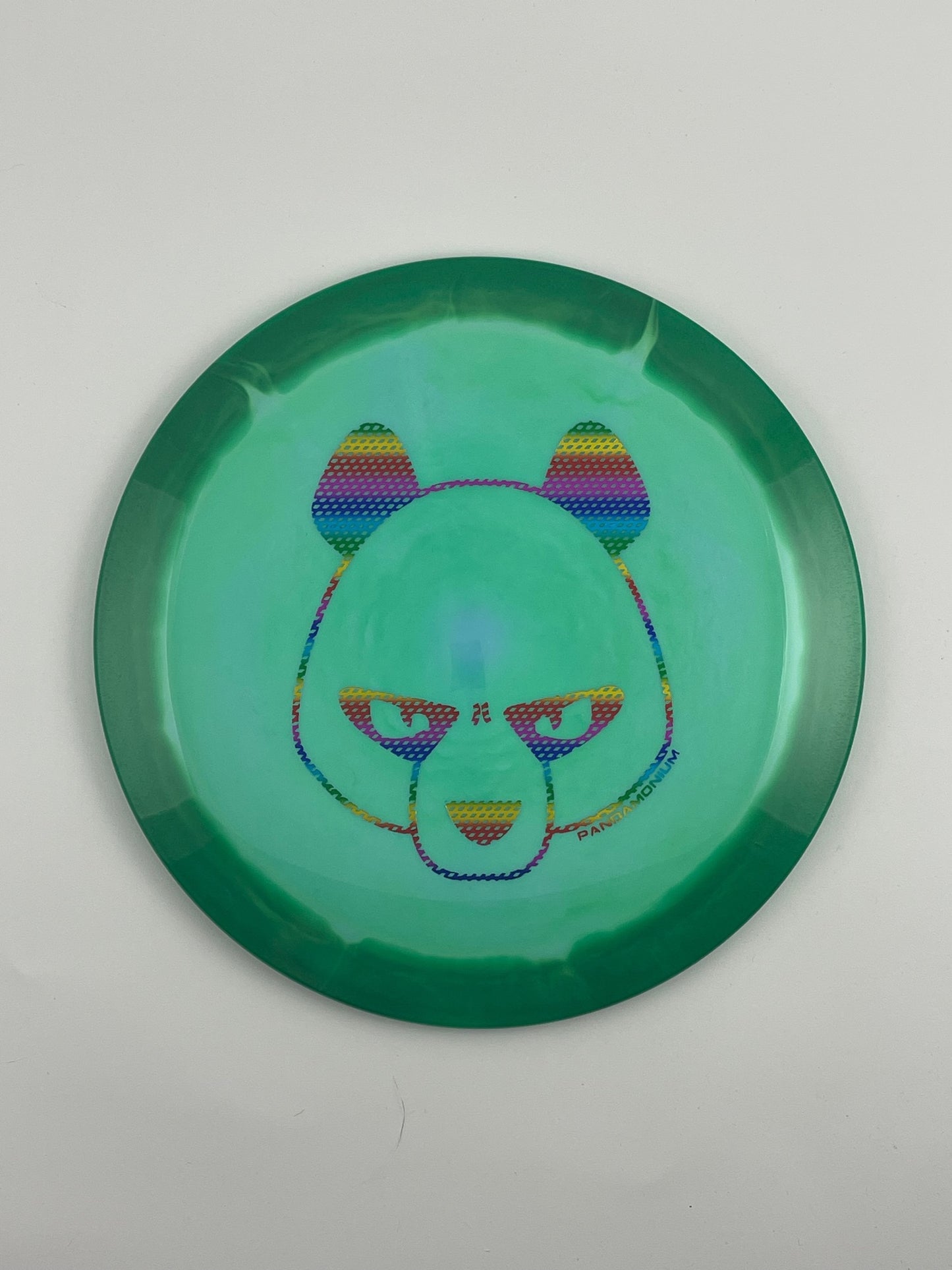 Innova Shryke disc golf distance driver in green and light green Halo Star plastic with Pandamonium Big Panda stamp