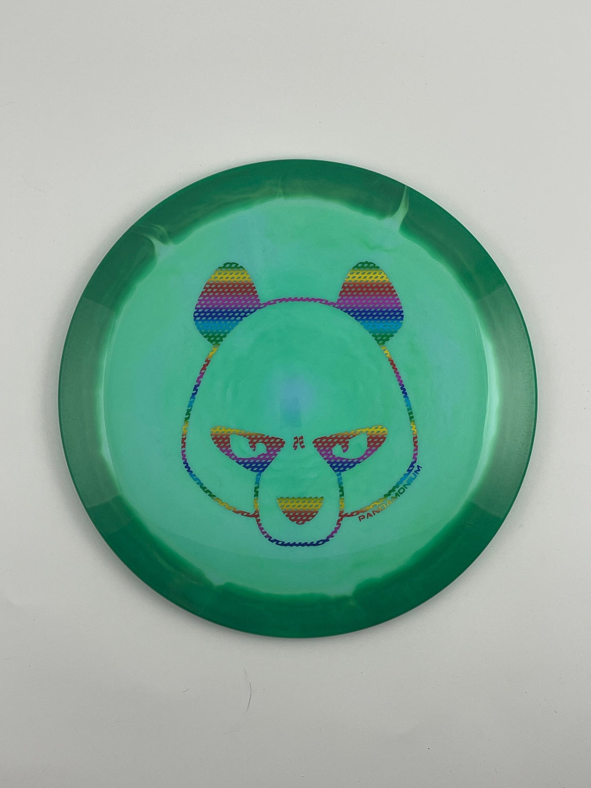 Innova Shryke disc golf distance driver in green and light green Halo Star plastic with Pandamonium Big Panda stamp
