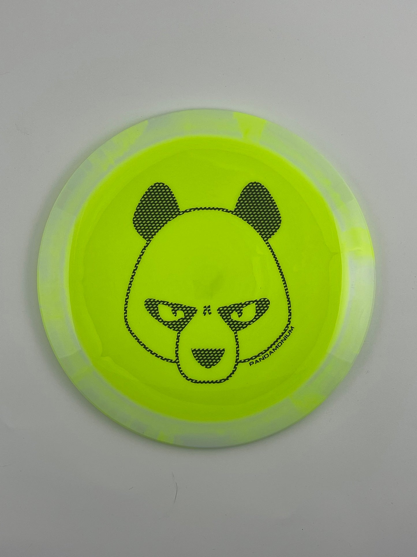Innova Shryke disc golf distance driver in light yellow Halo Star plastic with Pandamonium Big Panda stamp
