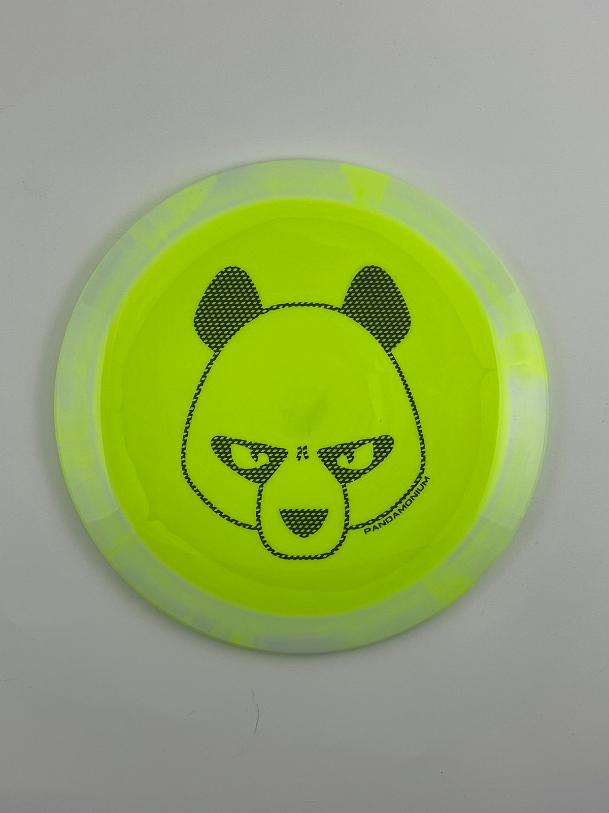 Innova Shryke disc golf distance driver in light yellow Halo Star plastic with Pandamonium Big Panda stamp
