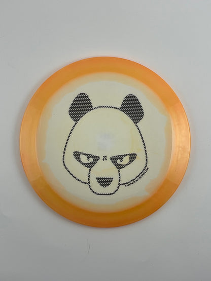 Innova Shryke disc golf distance driver in orange and white Halo Star plastic with Pandamonium Big Panda stamp
