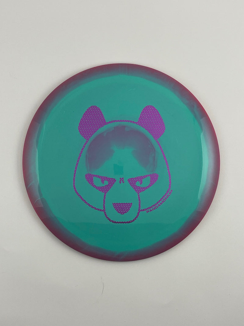 Innova Tern disc golf distance driver in purple and teal Halo Star plastic with Pandamonium Big Panda stamp
