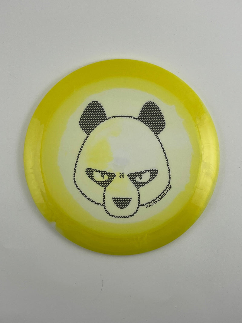 Innova Tern disc golf distance driver in yellow and white Halo Star plastic with Pandamonium Big Panda stamp