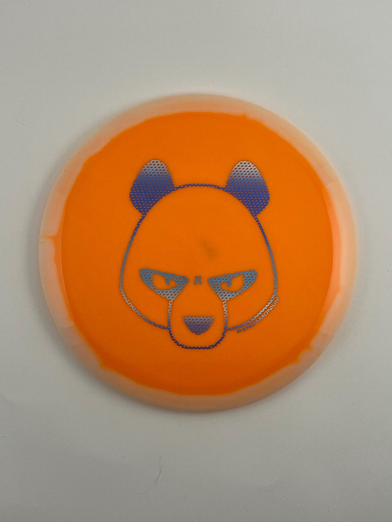 Innova Valkyrie disc golf fairway driver in cream and orange Halo Star plastic with Pandamonium Big Panda stamp