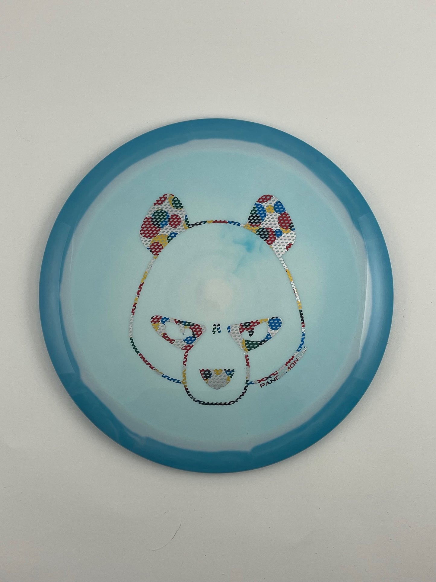 Innova Wraith disc golf distance driver in blue and light blue Halo Star plastic with Pandamonium Big Panda stamp