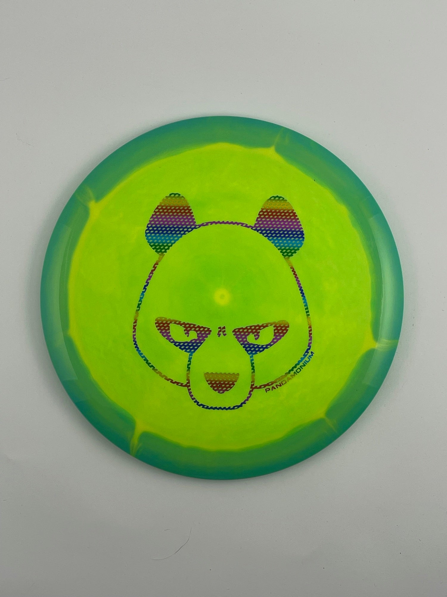 Innova Wraith disc golf distance driver in green and light green Halo Star plastic with Pandamonium Big Panda stamp