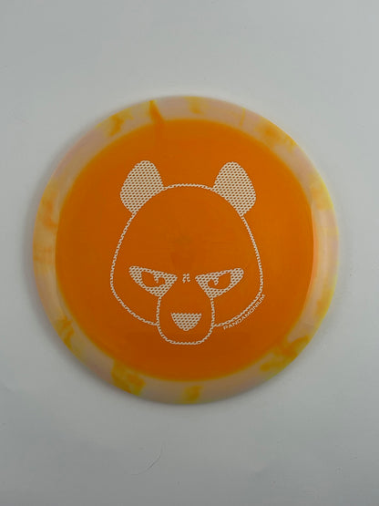 Innova Wraith disc golf distance driver in orange Halo Star plastic with Pandamonium Big Panda stamp