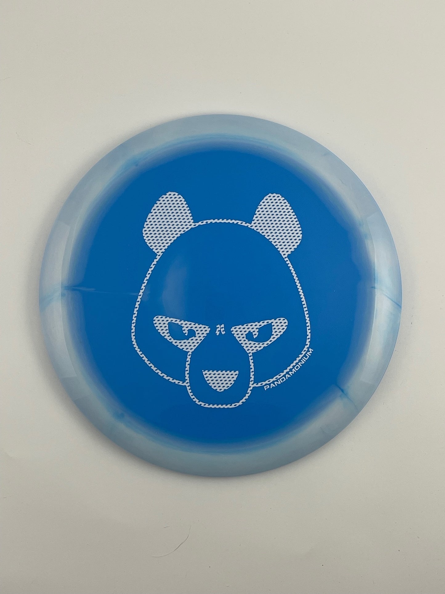 Innova Wraith disc golf distance driver in white and blue Halo Star plastic with Pandamonium Big Panda stamp