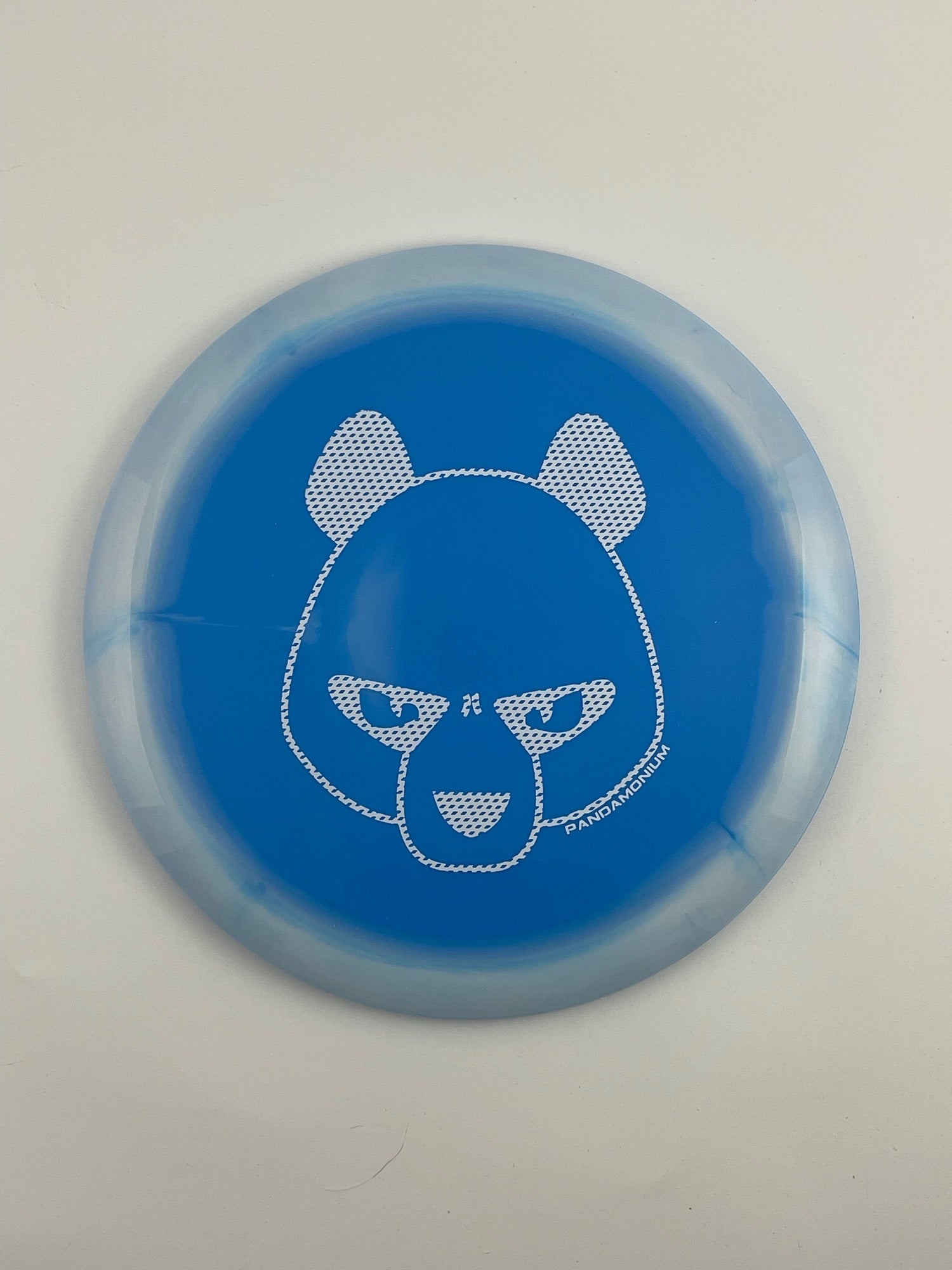 Innova Wraith disc golf distance driver in white and blue Halo Star plastic with Pandamonium Big Panda stamp