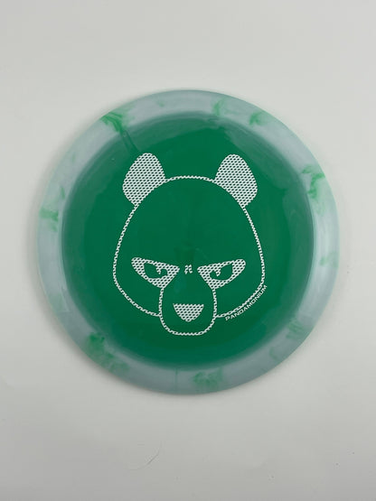 Innova Wraith disc golf distance driver in white and green Halo Star plastic with Pandamonium Big Panda stamp