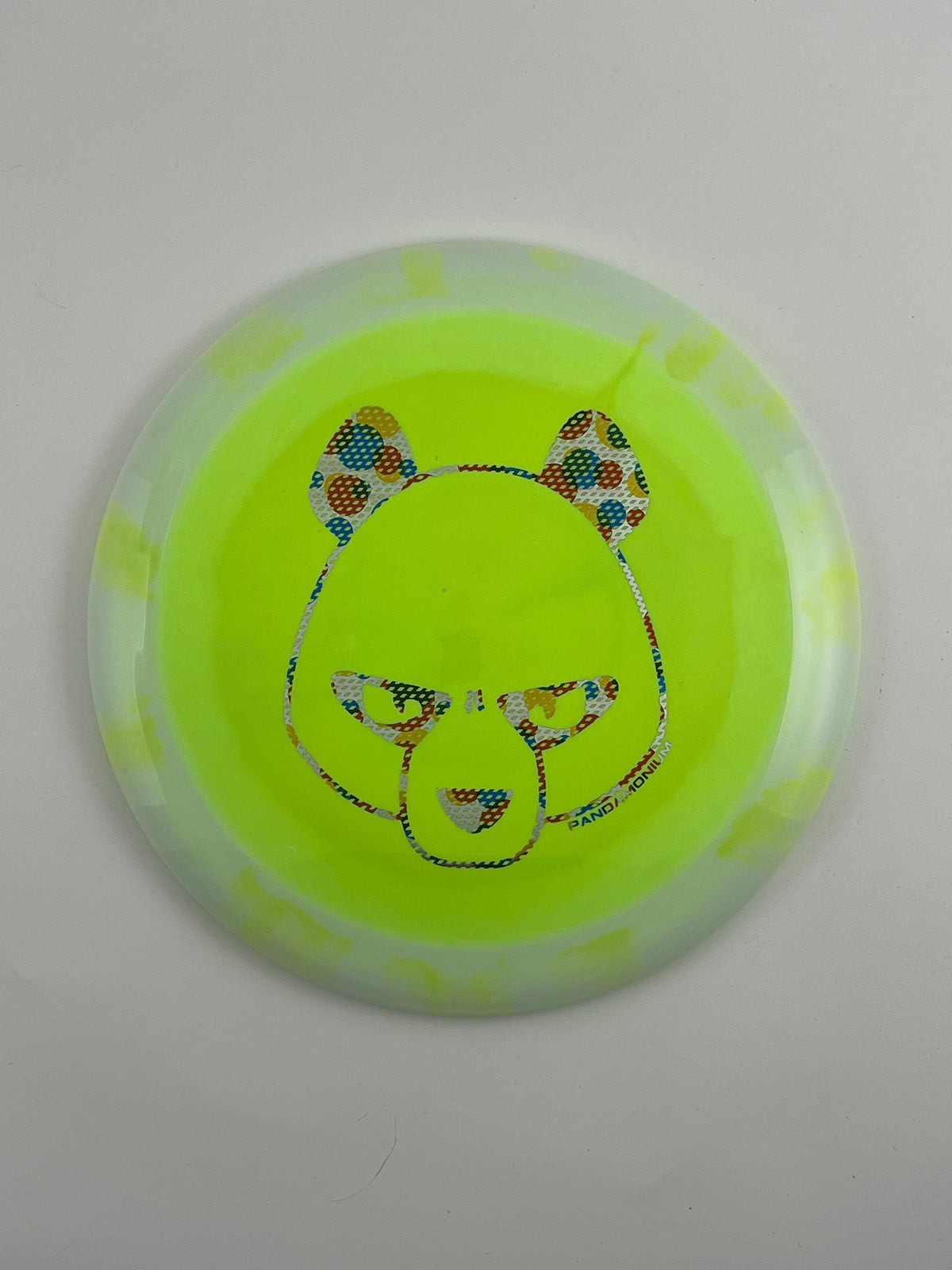 Innova Wraith disc golf distance driver in white and lime Halo Star plastic with Pandamonium Big Panda stamp