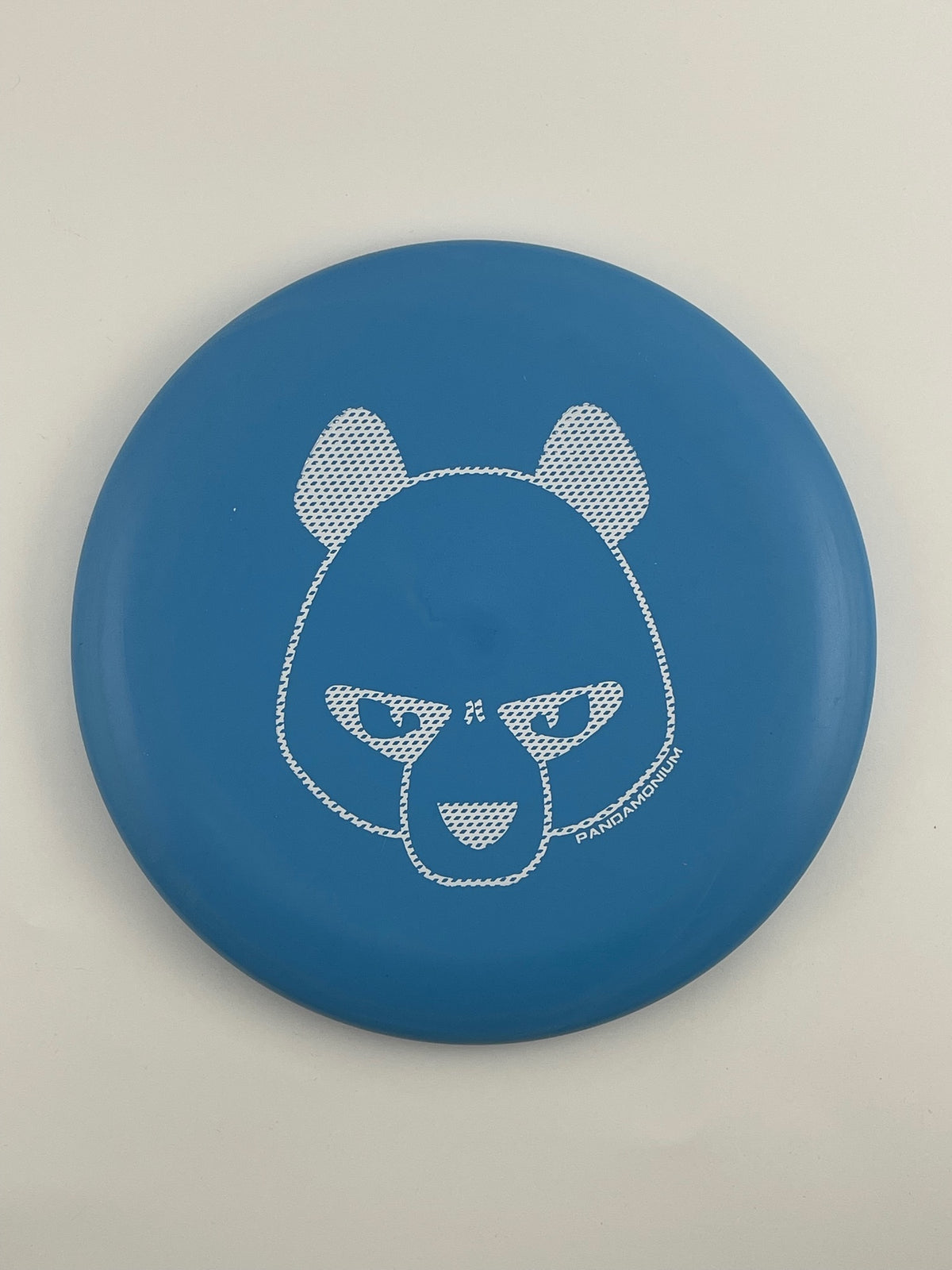 Innova JK Aviar disc golf putt and approach in blue Pro plastic with Pandamonium Big Panda stamp