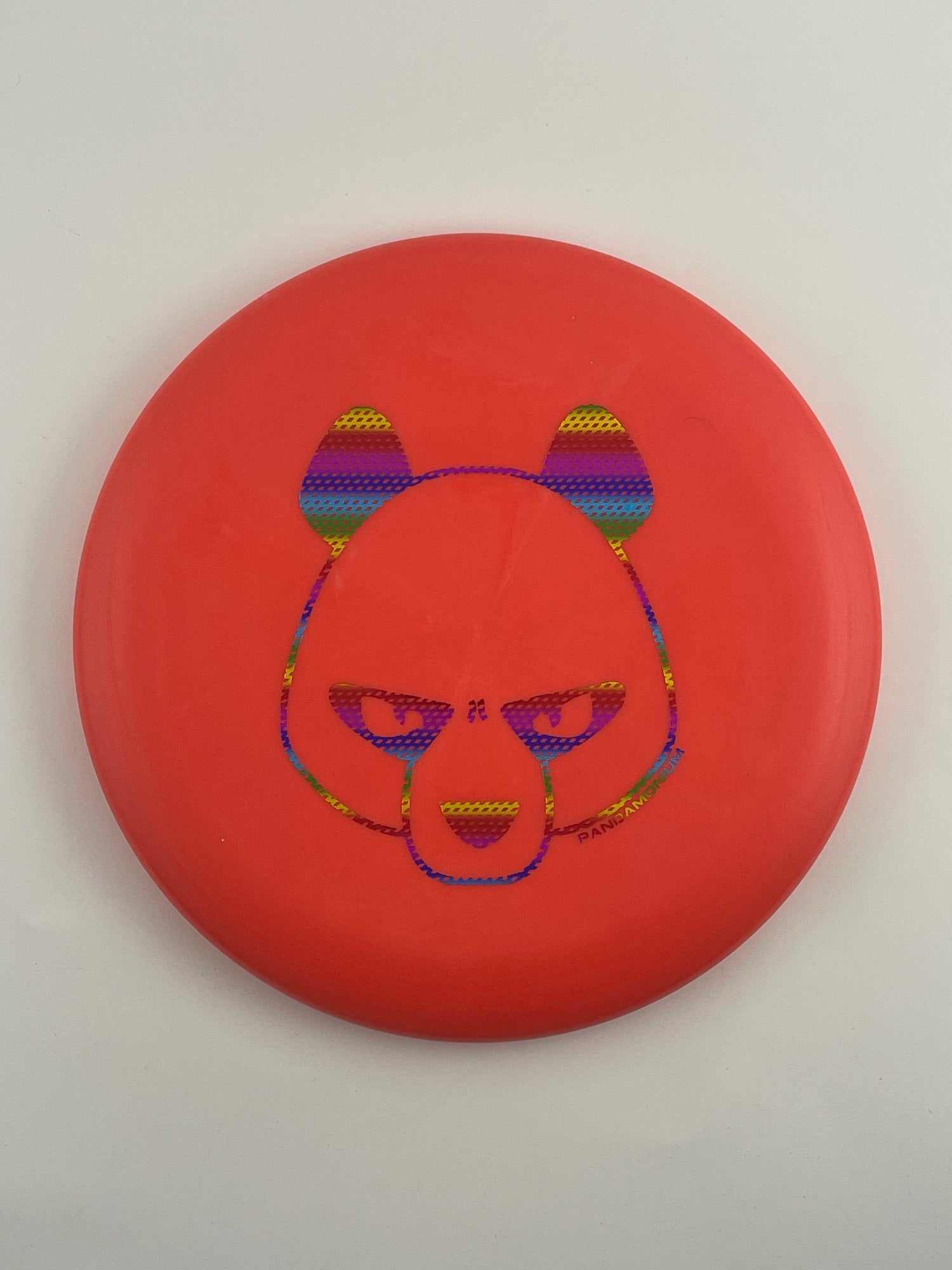 Innova JK Aviar disc golf putt and approach in red and orange Pro plastic with Pandamonium Big Panda stamp