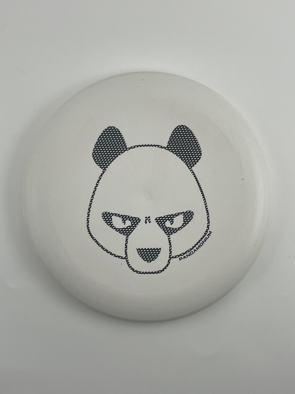 Innova JK Aviar disc golf putt and approach in white Pro plastic with Pandamonium Big Panda stamp